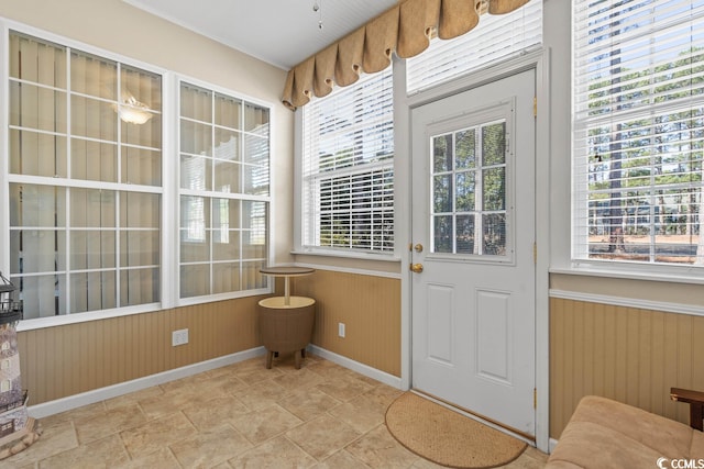 sunroom featuring a wealth of natural light