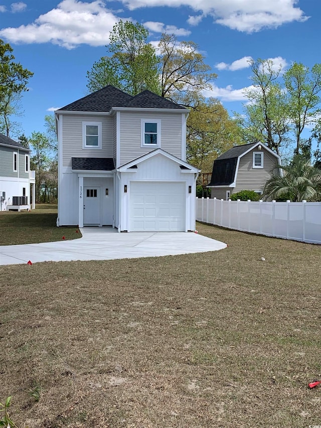 exterior space with a lawn and a garage