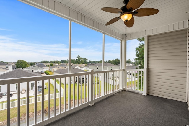 balcony featuring ceiling fan