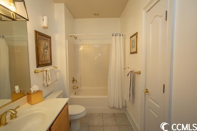 full bathroom featuring toilet, tile floors, vanity, and shower / bath combo