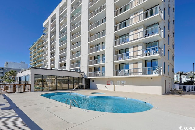 view of pool with a patio area