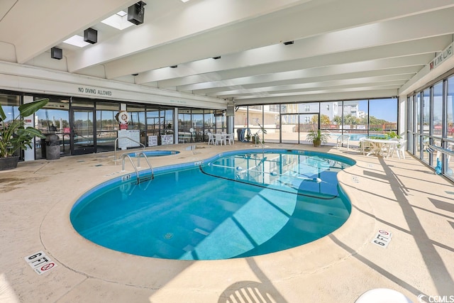 view of pool featuring a patio area