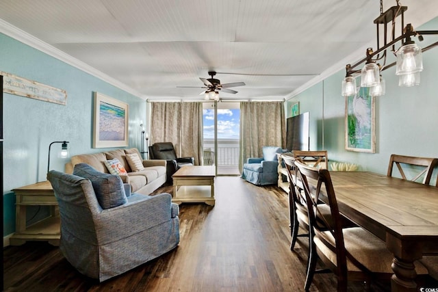 living room with crown molding, ceiling fan, dark wood-type flooring, and a wall of windows