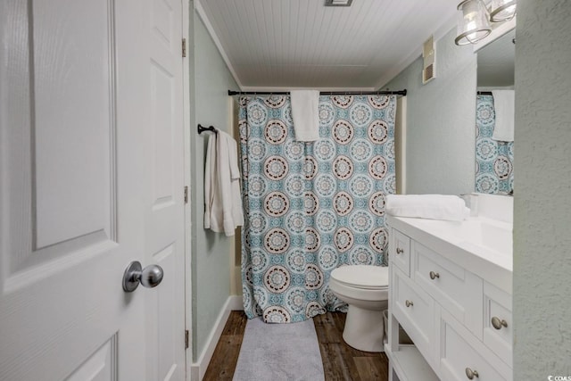 full bathroom with vanity, hardwood / wood-style flooring, toilet, and shower / bathtub combination with curtain