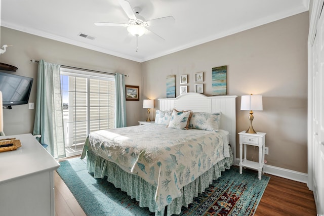 bedroom featuring hardwood / wood-style floors, ceiling fan, ornamental molding, and access to outside