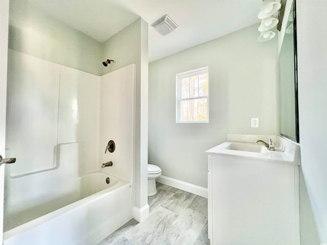 full bathroom with vanity, washtub / shower combination, and toilet