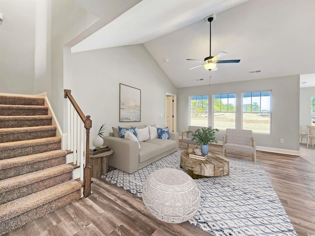 living room with high vaulted ceiling, hardwood / wood-style flooring, and ceiling fan