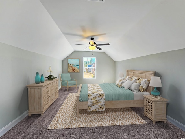 bedroom featuring dark colored carpet, vaulted ceiling, and ceiling fan