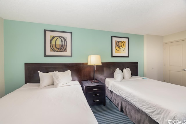 bedroom featuring a textured ceiling