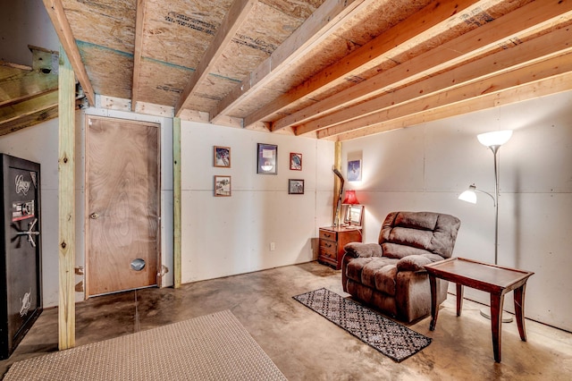 living area with concrete floors