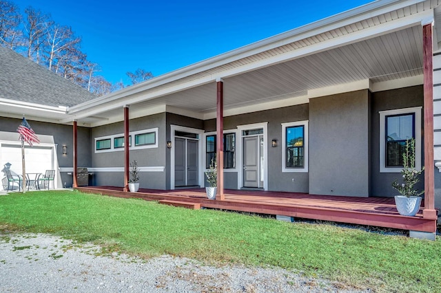 doorway to property with a yard