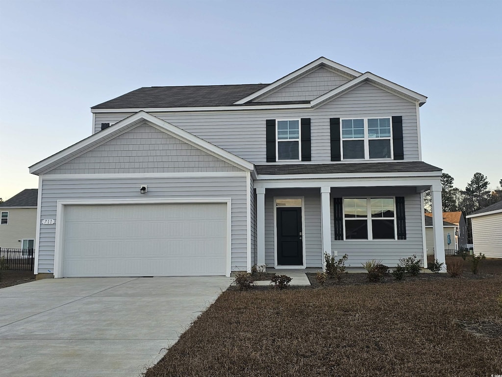 view of front of house with a garage