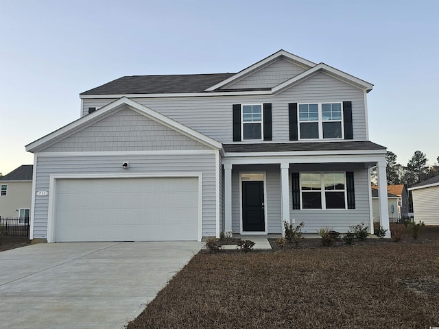 view of front of house with a garage