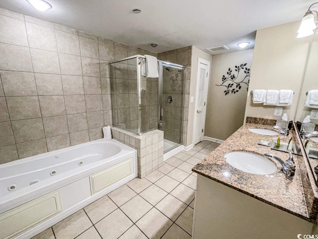 bathroom with tile flooring, independent shower and bath, and dual bowl vanity