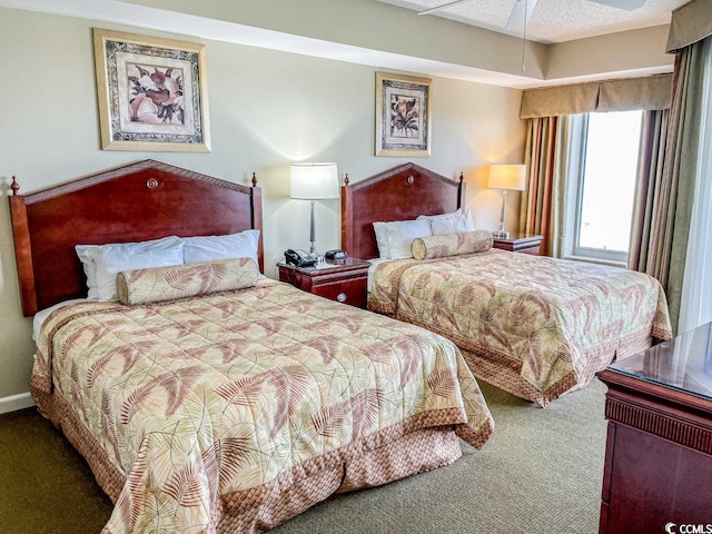 bedroom featuring ceiling fan and carpet flooring