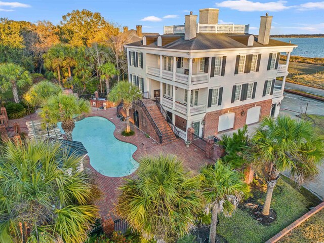 101 Greenwich Dr, Georgetown, SC 29440 - outdoor pool with a patio area and a water view