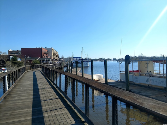 view of dock with a water view