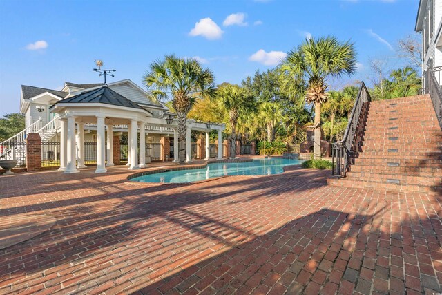 101 Greenwich Dr, Georgetown, SC 29440 - view of swimming pool with stairs and a patio