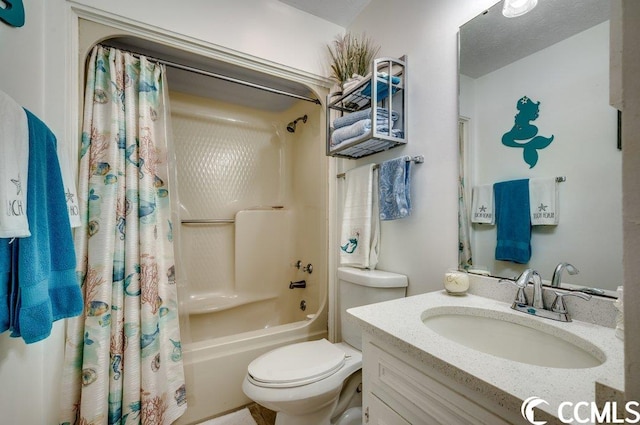 full bathroom with vanity, shower / bath combo, and toilet