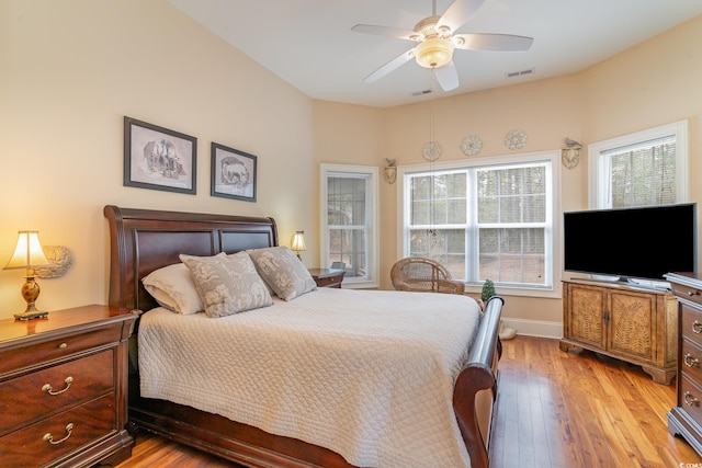 bedroom featuring ceiling fan and light hardwood / wood-style floors