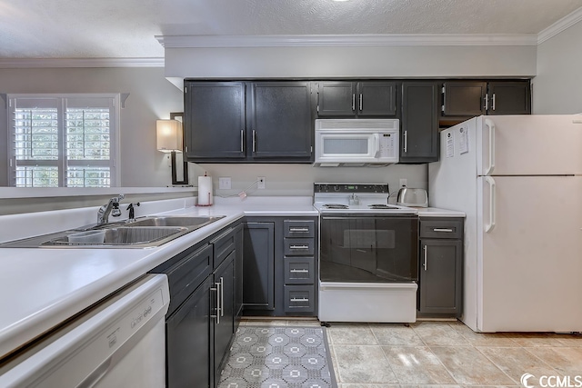 kitchen with white appliances, sink, crown molding, light tile flooring, and a textured ceiling