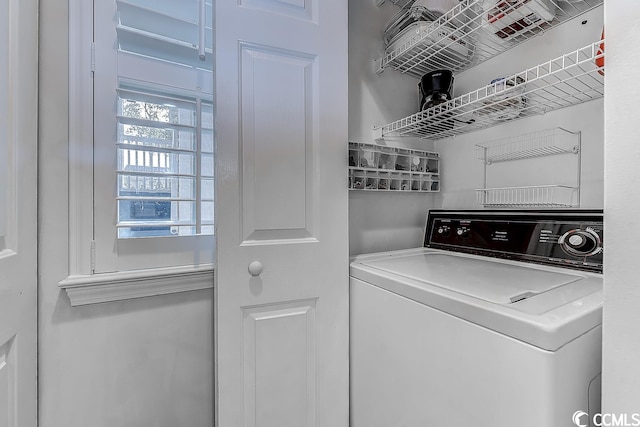 washroom with washer / clothes dryer