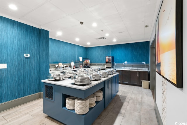 kitchen featuring a center island and light tile floors