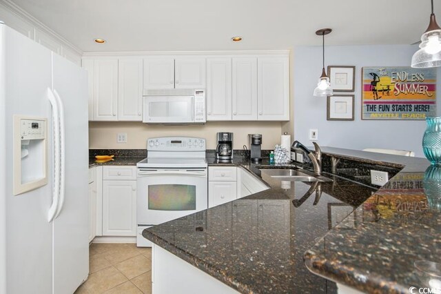 603 S Ocean Blvd Unit 1115, North Myrtle Beach, SC 29582 - kitchen featuring white appliances, a sink, white cabinetry, light tile patterned floors, and decorative light fixtures