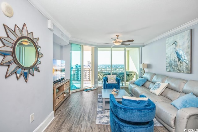 603 S Ocean Blvd Unit 1115, North Myrtle Beach, SC 29582 - living room with crown molding, a ceiling fan, wood finished floors, floor to ceiling windows, and baseboards