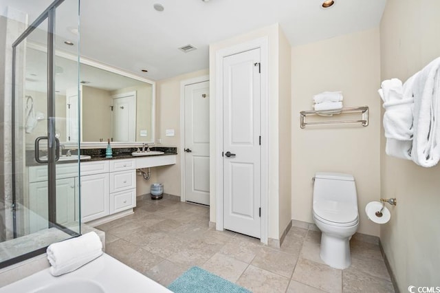 603 S Ocean Blvd Unit 1115, North Myrtle Beach, SC 29582 - full bath with a shower stall, baseboards, vanity, and toilet
