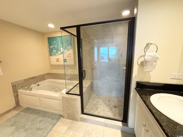603 S Ocean Blvd Unit 1115, North Myrtle Beach, SC 29582 - bathroom featuring a stall shower, vanity, a jetted tub, tile patterned flooring, and recessed lighting