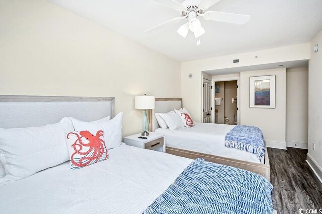 603 S Ocean Blvd Unit 1115, North Myrtle Beach, SC 29582 - bedroom with wood finished floors, baseboards, and ceiling fan