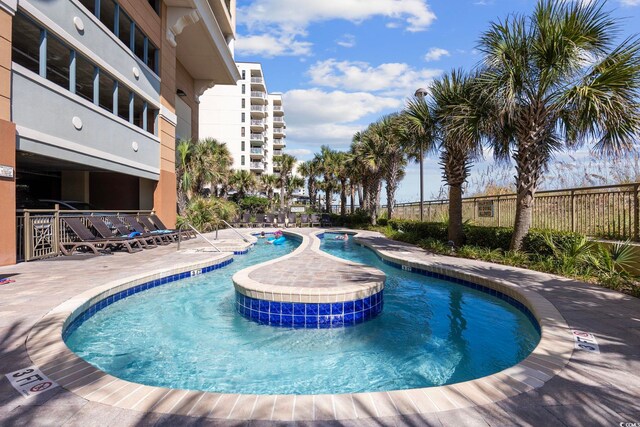 603 S Ocean Blvd Unit 1115, North Myrtle Beach, SC 29582 - view of swimming pool with fence