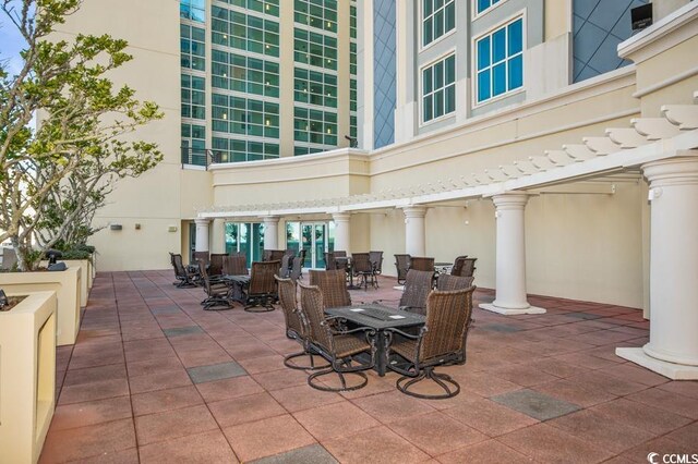 603 S Ocean Blvd Unit 1115, North Myrtle Beach, SC 29582 - view of patio featuring outdoor dining area