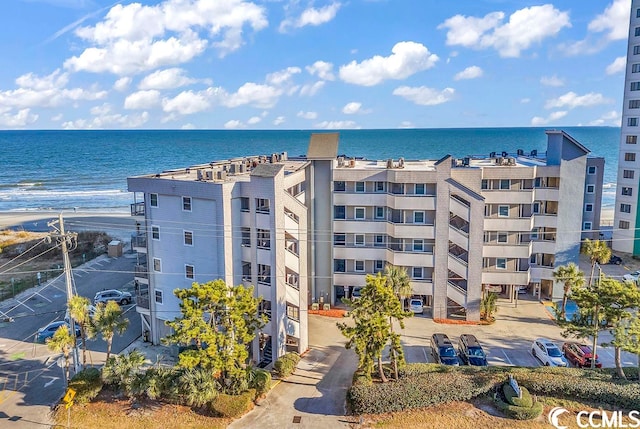 view of building exterior featuring a water view