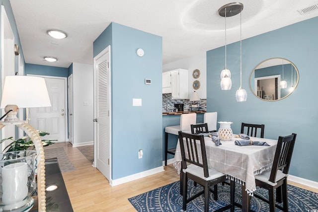 dining area featuring light hardwood / wood-style flooring