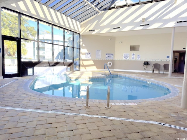 view of pool featuring a hot tub