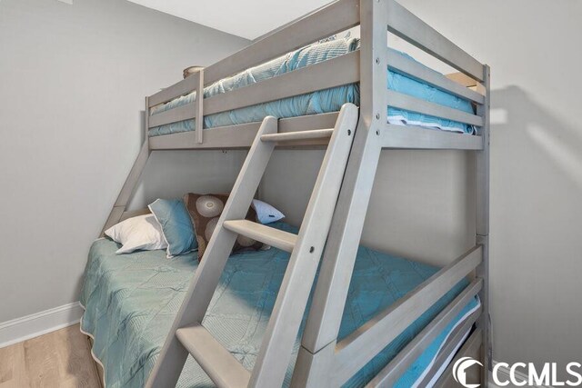 bedroom with light wood-type flooring