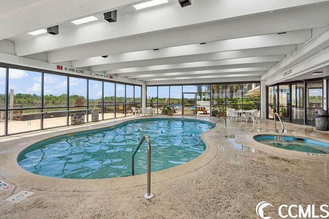 view of pool featuring a patio