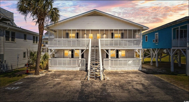 view of front of property with a sunroom