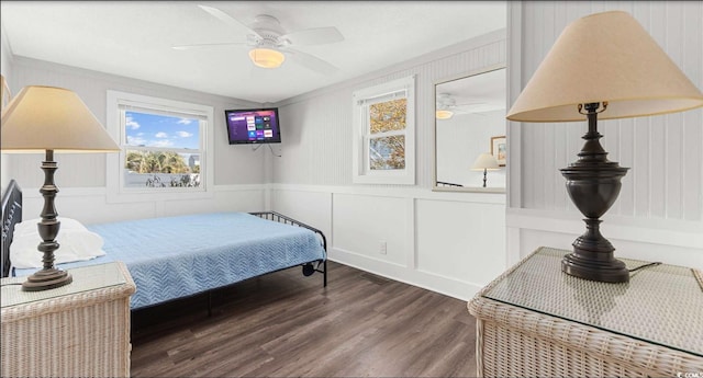 bedroom with hardwood / wood-style flooring and ceiling fan