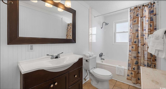 full bathroom with tile patterned flooring, vanity, shower / bath combination with curtain, and toilet