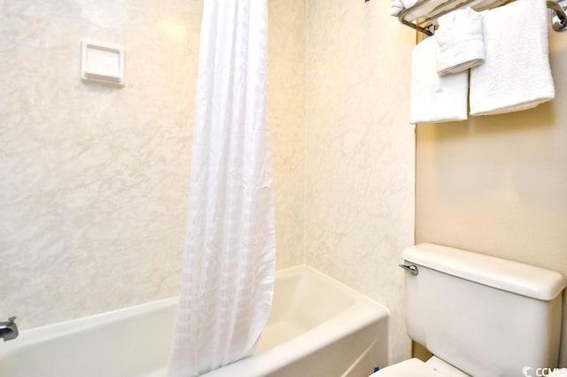 bathroom featuring toilet and shower / tub combo with curtain