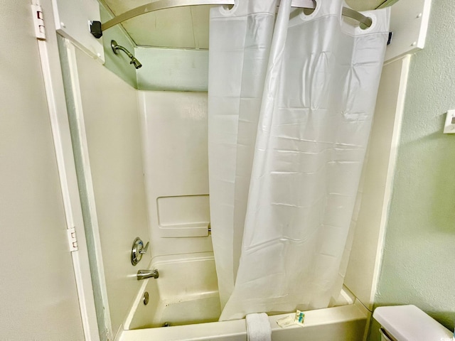1207 S Ocean Blvd Unit 50804, Myrtle Beach, SC 29577 - bathroom with shower / bath combo with shower curtain and a textured wall