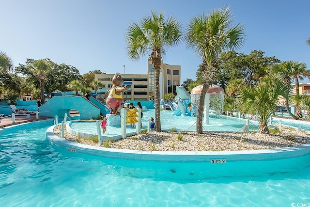 1207 S Ocean Blvd Unit 50804, Myrtle Beach, SC 29577 - community pool featuring a water slide and a water play area