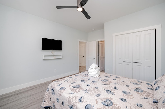 503 30th Ave N, Myrtle Beach, SC 29577 - bedroom featuring light wood-style floors, a closet, baseboards, and a ceiling fan