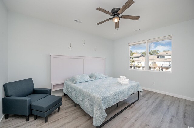 503 30th Ave N, Myrtle Beach, SC 29577 - bedroom with light wood-style flooring, baseboards, and ceiling fan