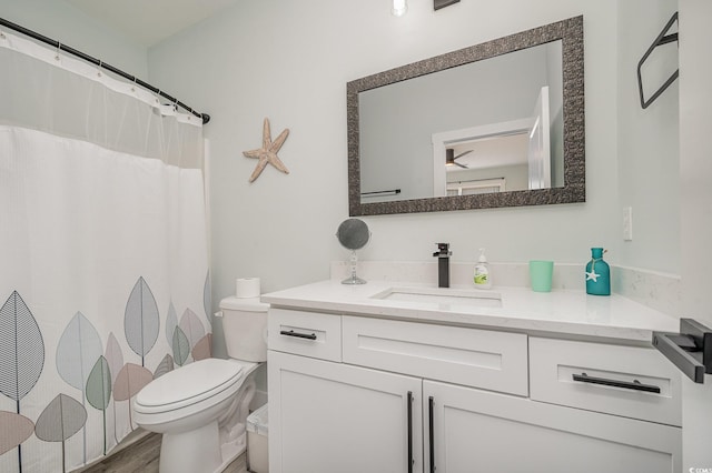 503 30th Ave N, Myrtle Beach, SC 29577 - full bath with vanity, toilet, curtained shower, and wood finished floors
