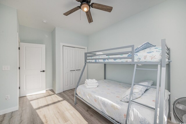 503 30th Ave N, Myrtle Beach, SC 29577 - bedroom featuring wood finished floors, a closet, baseboards, and a ceiling fan