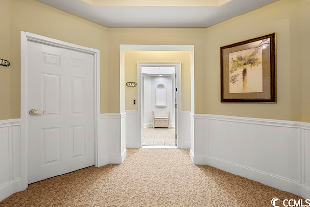 corridor featuring carpet floors